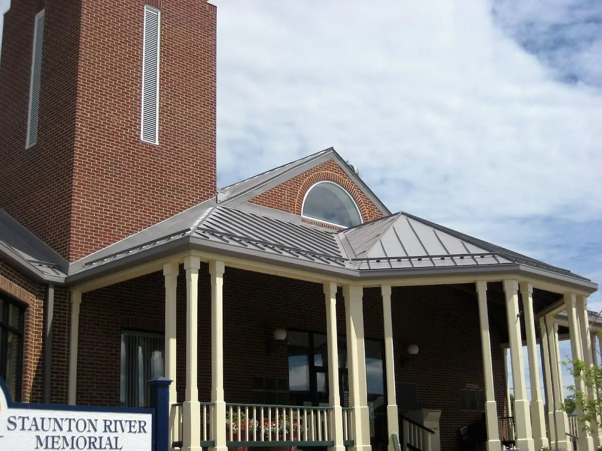 Skilled roofing craftsmen working on a residential roof in Lavers
